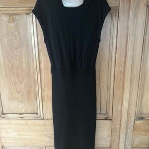 Alice and Olivia Black Dress with twisted open back. New with tags.